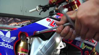 How To Remove Honda Rear Shock  TransWorld MOTOcross [upl. by Trebor]